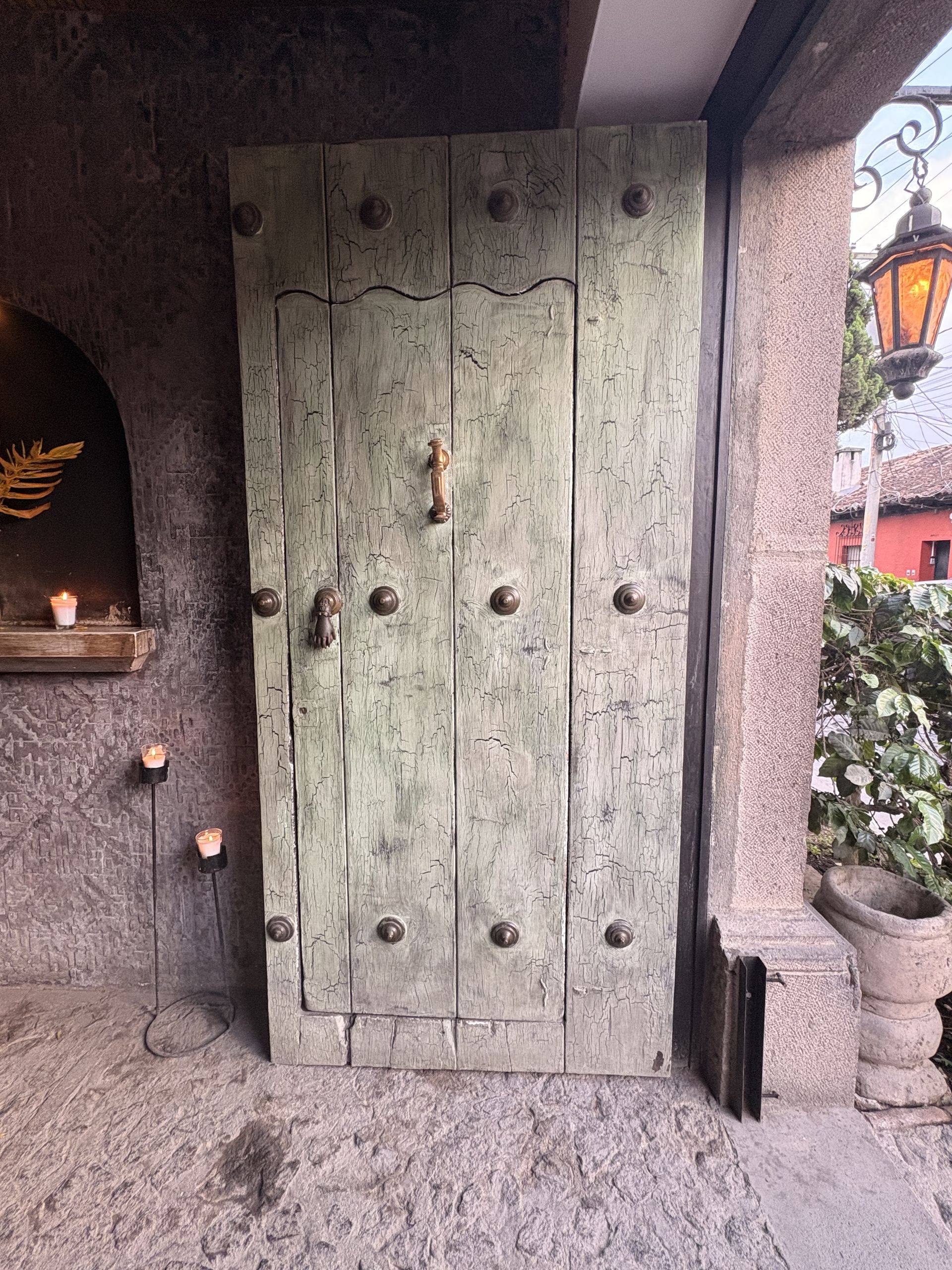 Weathered wooden colonial door in Antigua Guatemala