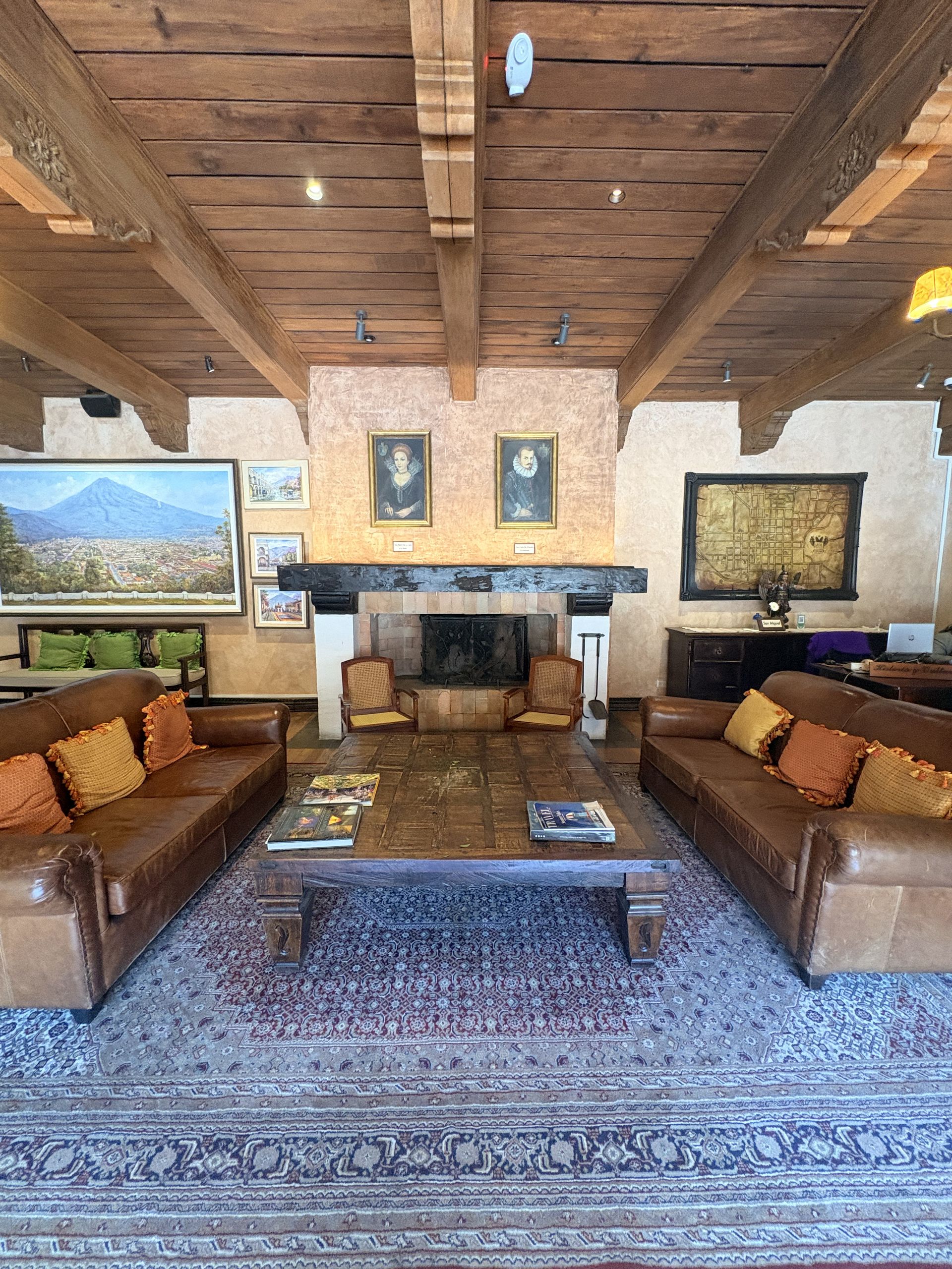 Colonial hotel interior with plunge pool and stone arches in Antigua Guatemala